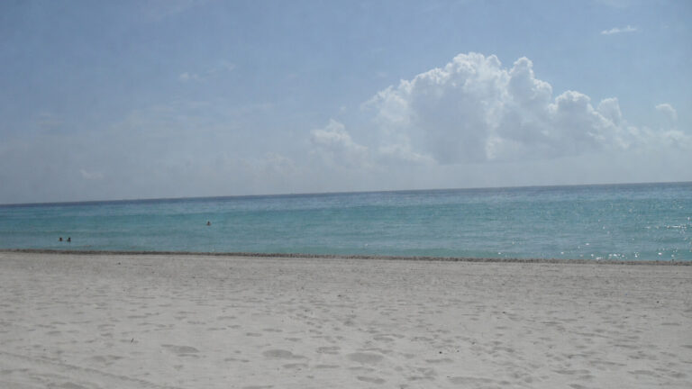 Calm Atlantic Ocean and sandy beach in Coastal South Florida.